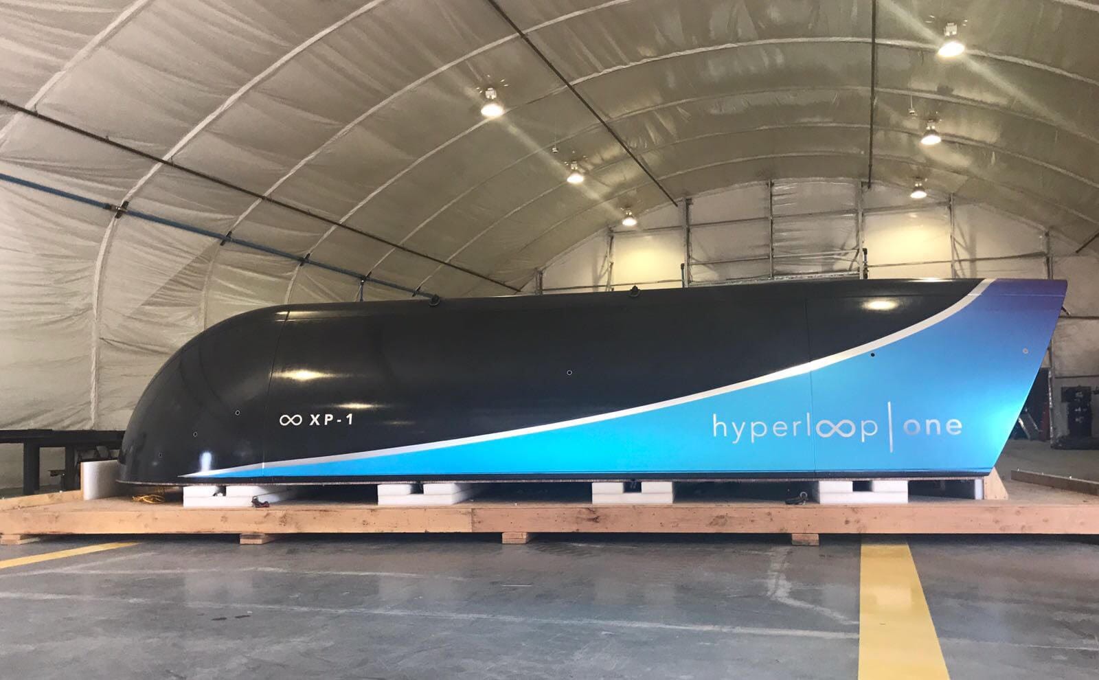Hyperloop One Achieves Successful Full Systems Test unveils Pod for passsenger cargo urban mobility